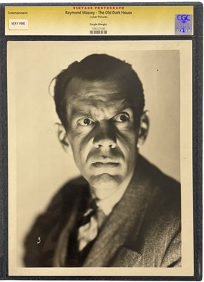Lot 57 - A CGC graded black and white headshot of...