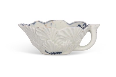 Lot 108 - A rare Lowestoft porcelain butter boat moulded...