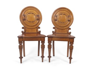 Lot 333 - A pair of early Victorian oak hall chairs with...