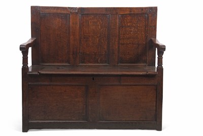 Lot 348 - A late 17th Century oak box settle with three...