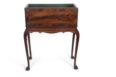 Lot 372 - A Georgian Revival mahogany plant stand or...