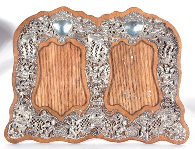 Lot 71 - Late Victorian double silver photograph frame...