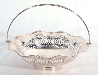 Lot 100 - George V silver swing handled dish having a...