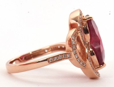 Lot 7 - A rose gold, ruby and diamond ring, the heart...