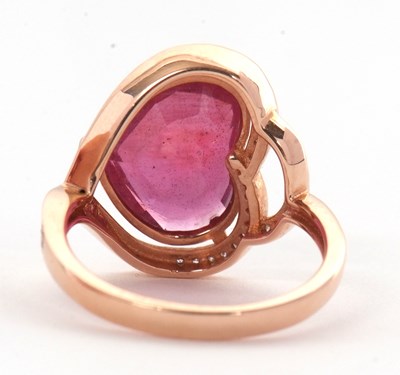 Lot 7 - A rose gold, ruby and diamond ring, the heart...