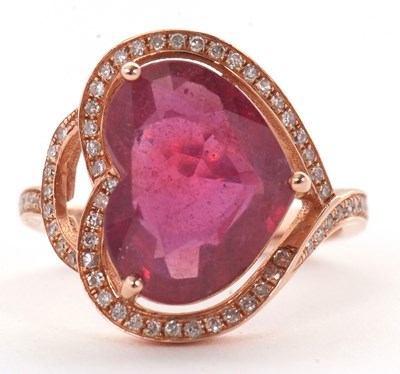 Lot 7 - A rose gold, ruby and diamond ring, the heart...