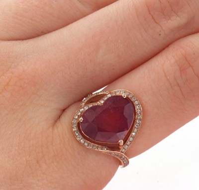 Lot 7 - A rose gold, ruby and diamond ring, the heart...