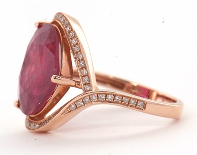 Lot 7 - A rose gold, ruby and diamond ring, the heart...
