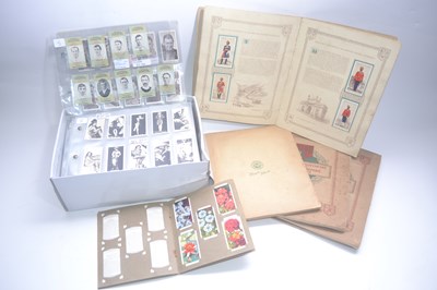 Lot 334 - Box containing quantity of early cigarette...