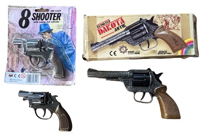 Lot 248 - Three vintage toy revolvers, to include:  - A...