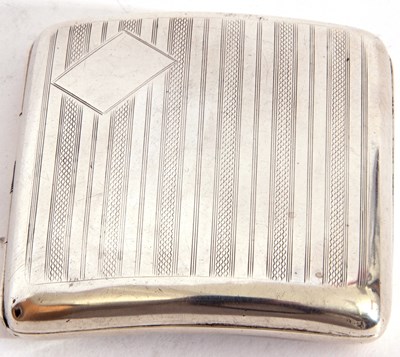 Lot 164 - George V silver cigarette case of shaped...