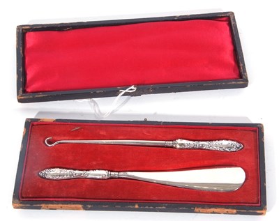Lot 199 - Victorian cased shoe horn and button hook,...