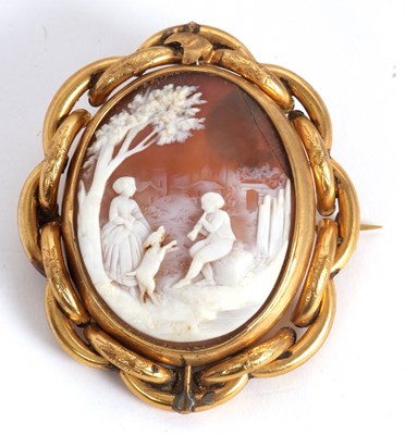 Lot 130 - A cameo brooch, the oval shell cameo with...