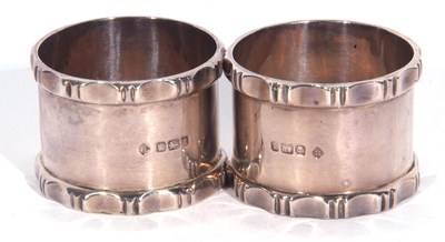 Lot 16 - Pair of George V napkin rings in industrial...