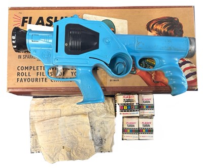 Lot 296 - A boxed 1965 Flashy Flickers Magic Picture Gun,...