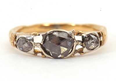 Lot 18 - An antique rose cut diamond ring, the central...