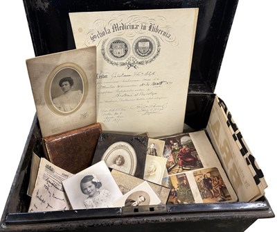 Lot 953 - PHOTOGRAPHS AND EPHEMERA. A Vintage tin trunk...