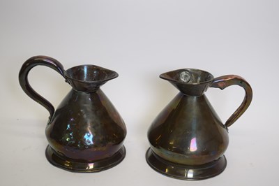 Lot 204 - Two small copper haystack measures