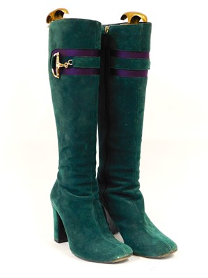 Lot 75 - Gucci: a pair of green suede knee high boots,...
