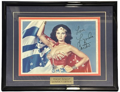 Lot 64 - LYNDA CARTER [WONDER WOMAN]: Framed and glazed...