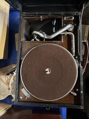 Lot 67 - A boxed wind up HMV record player together...