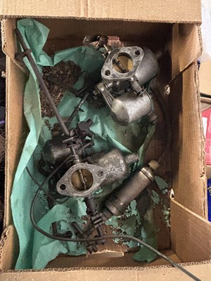 Lot 68 - Box containing two SU carburetors and other...