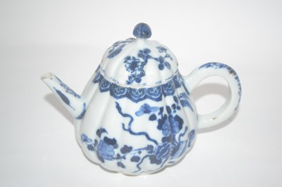 Lot 210 - A Chinese porcelain teapot, the fluted body...