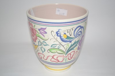 Lot 238 - A Poole Pottery vase with typical floral...