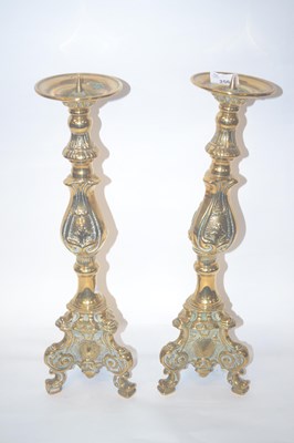 Lot 256 - A large pair of brass alter candlesticks, 46cm...