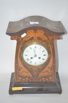 Lot 266 - An Art Nouveau style mantel clock with white...