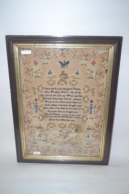 Lot 271 - A framed sampler embroidered in typical...