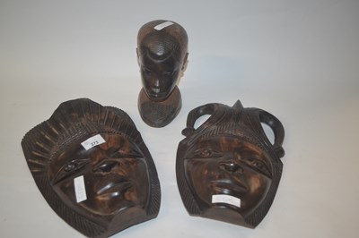 Lot 273 - Group of two carved African wooden masks...