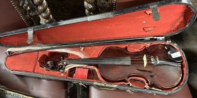 Lot 415 - An antique violin and accompanying bow, the...