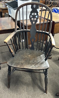 Lot 418 - A 19th Century stick and wheel back Windsor...