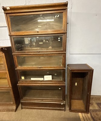 Lot 434 - A Globe Wernick six tier stacking oak bookcase...