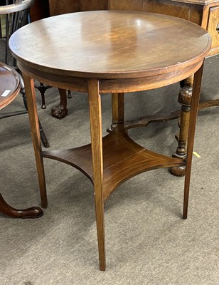 Lot 442 - An Edwardian mahogany lamp table, the centre...