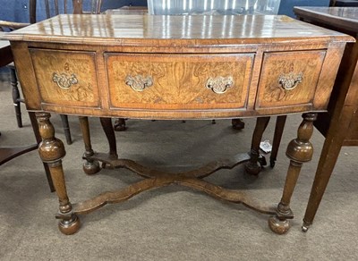 Lot 443 - A Queen Anne style walnut veneered bow front...