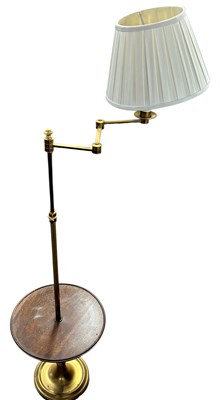 Lot 448 - A 20th Century brass reading lamp with...