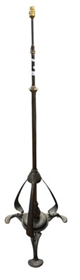 Lot 449 - An Arts & Crafts style brass adjustable...