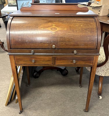 Lot 457 - An Edwardian mahogany cylinder desk, the roll...