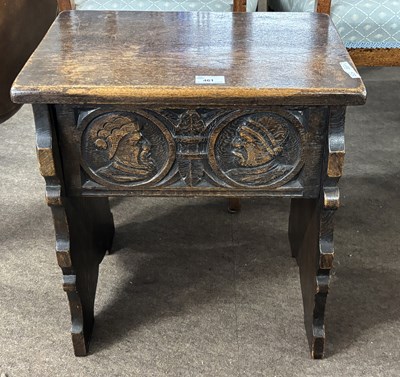 Lot 461 - A 20th Century oak box stool in Tudor style...