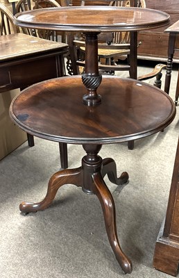 Lot 386 - A Georgian mahogany dumb waiter of two tier...