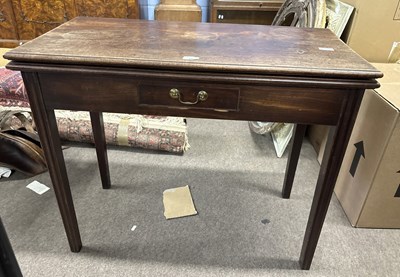 Lot 480 - A Georgian mahogany tea table of typical form...