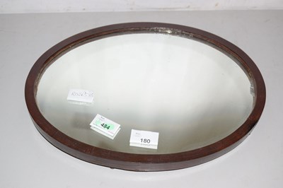 Lot 180 - A small Edwardian oval wall mirror, 37cm wide