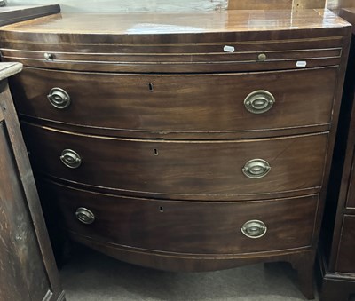 Lot 492 - A late Georgian mahogany bow front chest of...