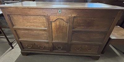 Lot 494 - An 18th Century oak mule chest with hinged lid...