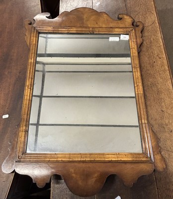 Lot 495 - A Georgian Revival fretwork framed walnut wall...