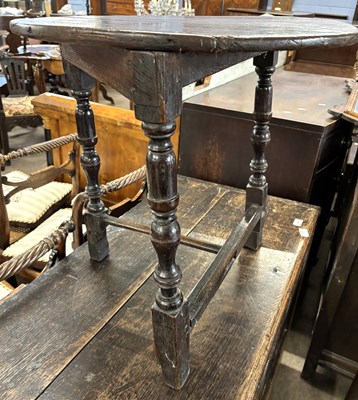 Lot 496 - A small oak and pine cricket type table formed...