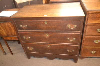 Lot 531 - A George III oak three drawer chest with brass...