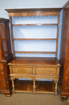 Lot 547 - A Georgian Revival oak dresser, the top...